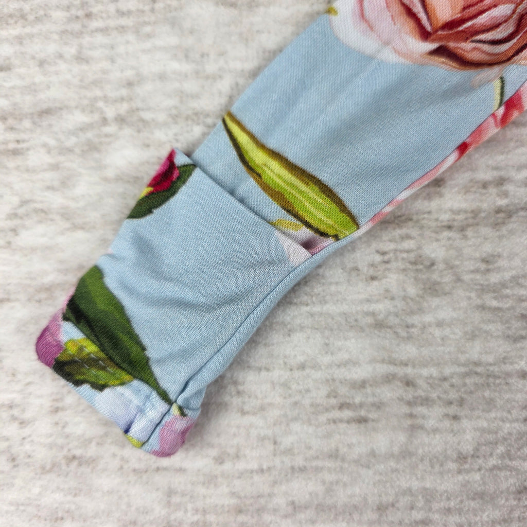 Pink purple and blue rose print close-up