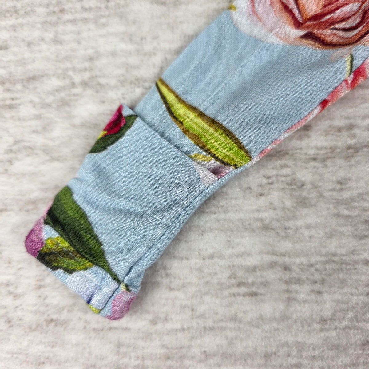 Pink purple and blue rose print close-up