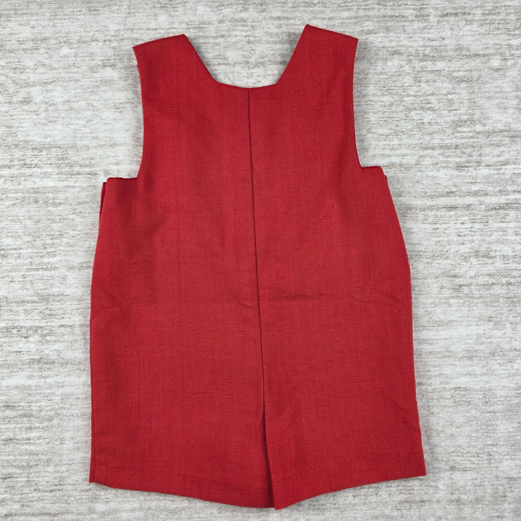 Angled welt pocket and side button detail