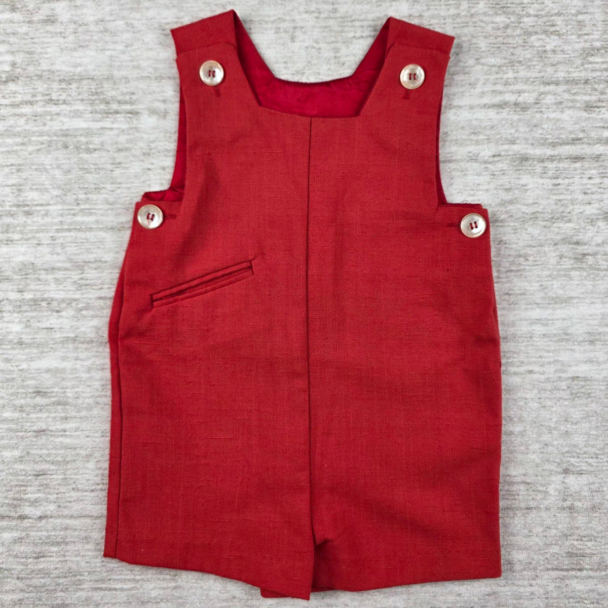 Red shortall front with shoulder and side buttons