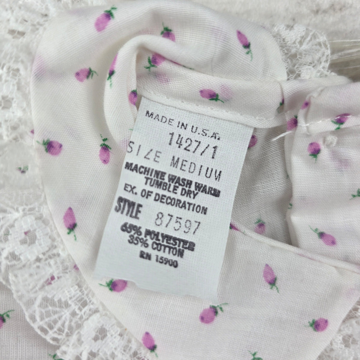 Original hangtag size chart and care instructions
